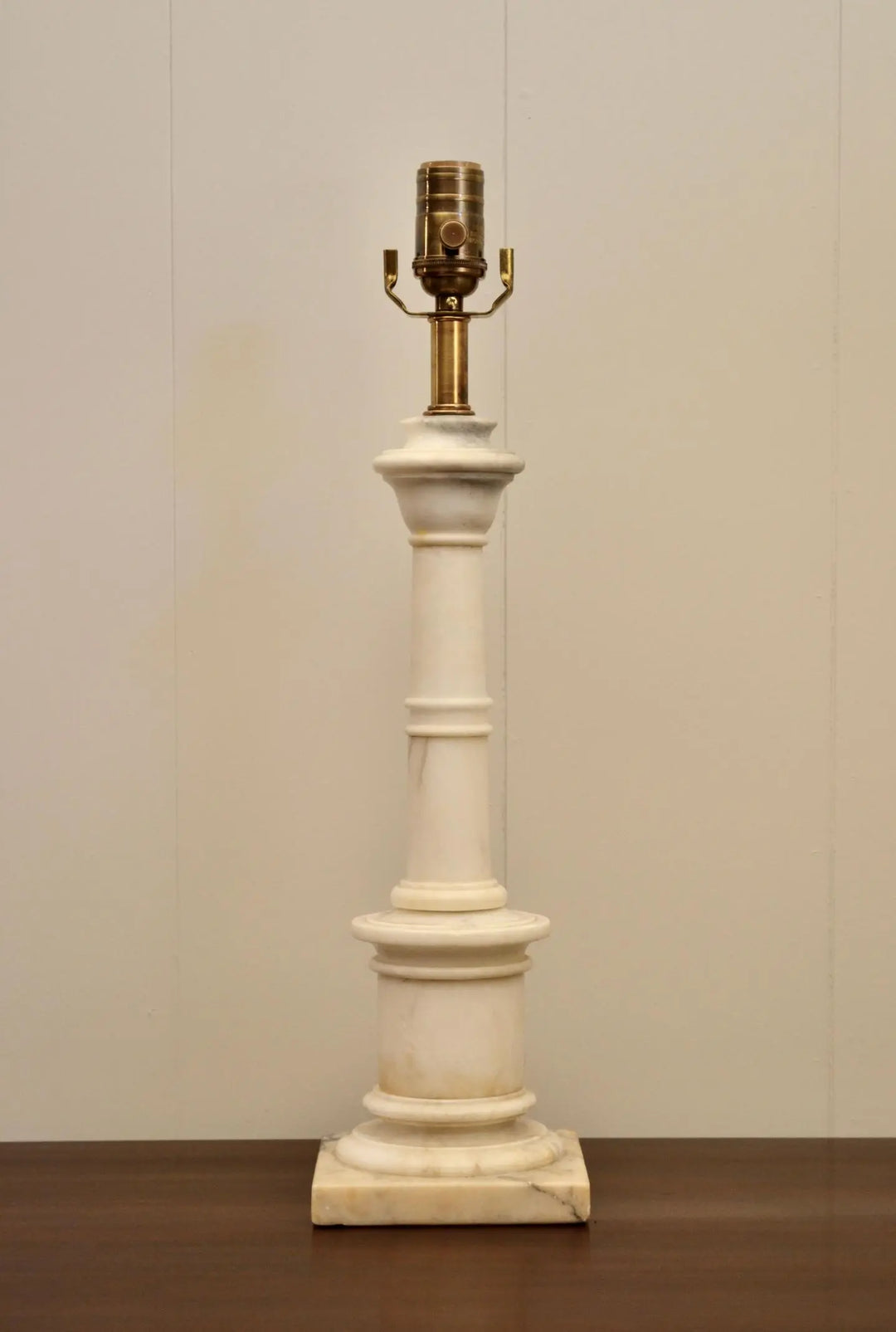 Top-down view highlighting carved details of a neoclassical alabaster urn lamp