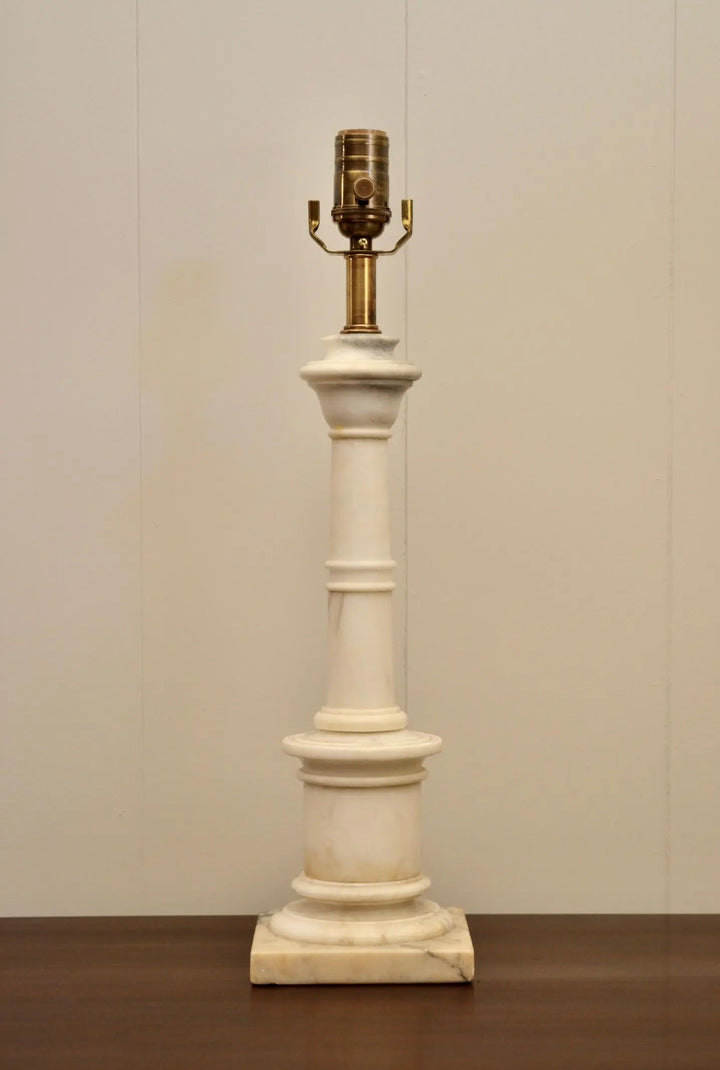 Top-down view highlighting carved details of a neoclassical alabaster urn lamp