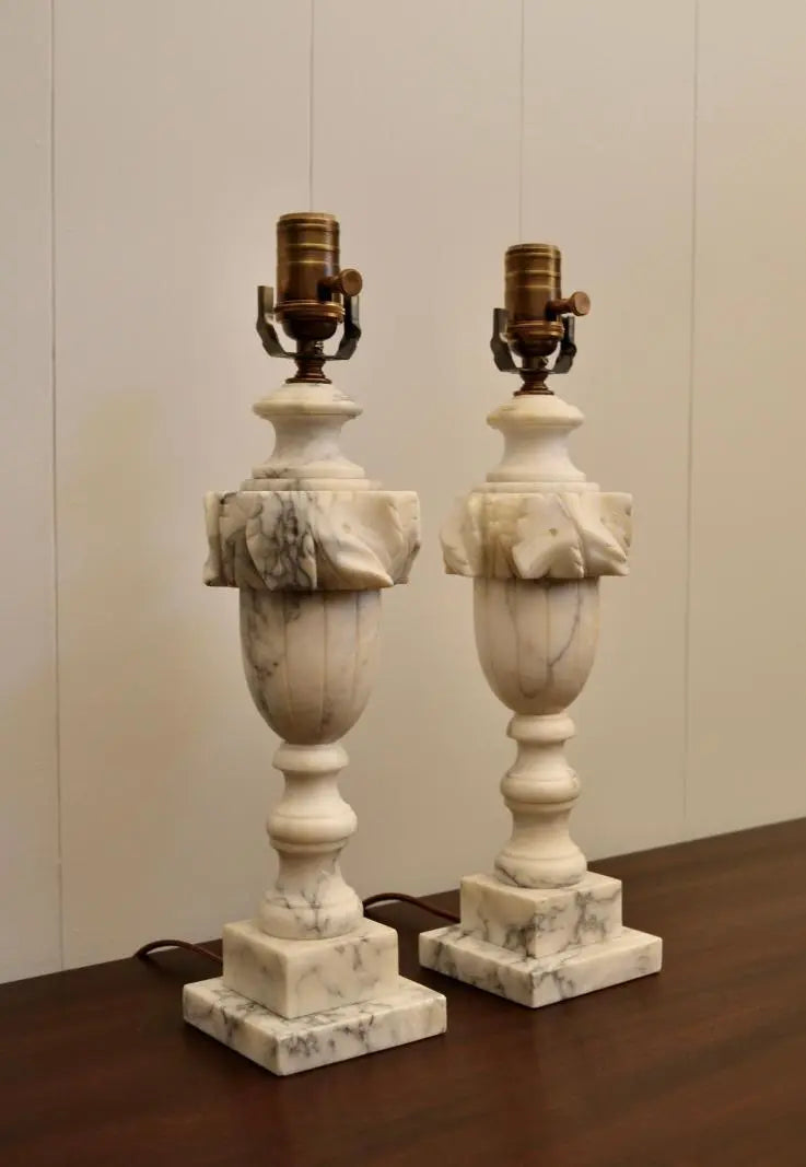 Pair of vintage white marble table lamps with carved leaf detailing and stepped square bases
