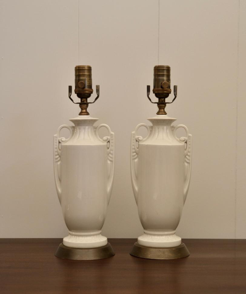 Matching set of tall white ceramic urn lamps with harp fittings